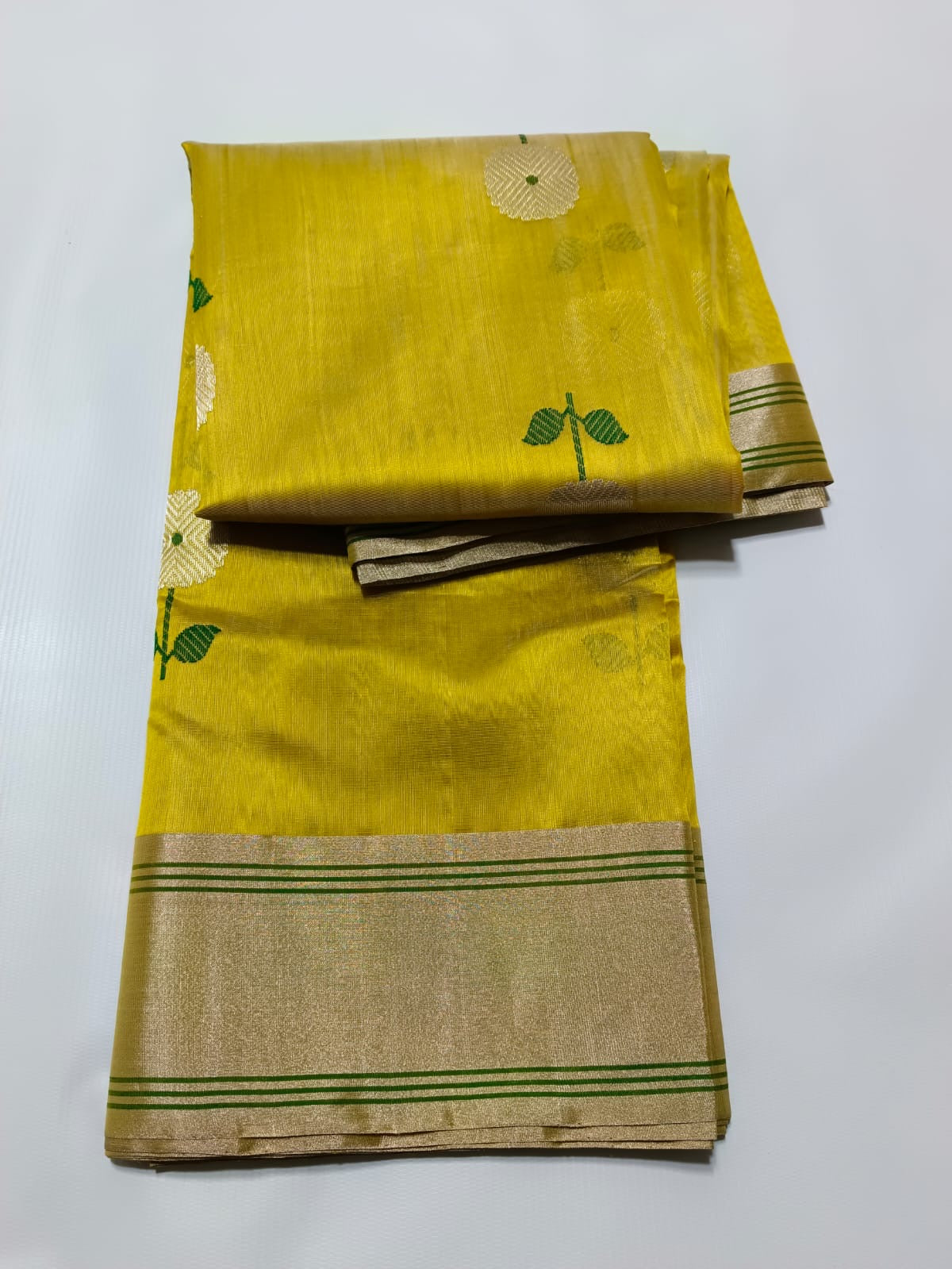 Beautiful Chanderi Pattu Silk Saree with silver zari and meenakari thread weave .