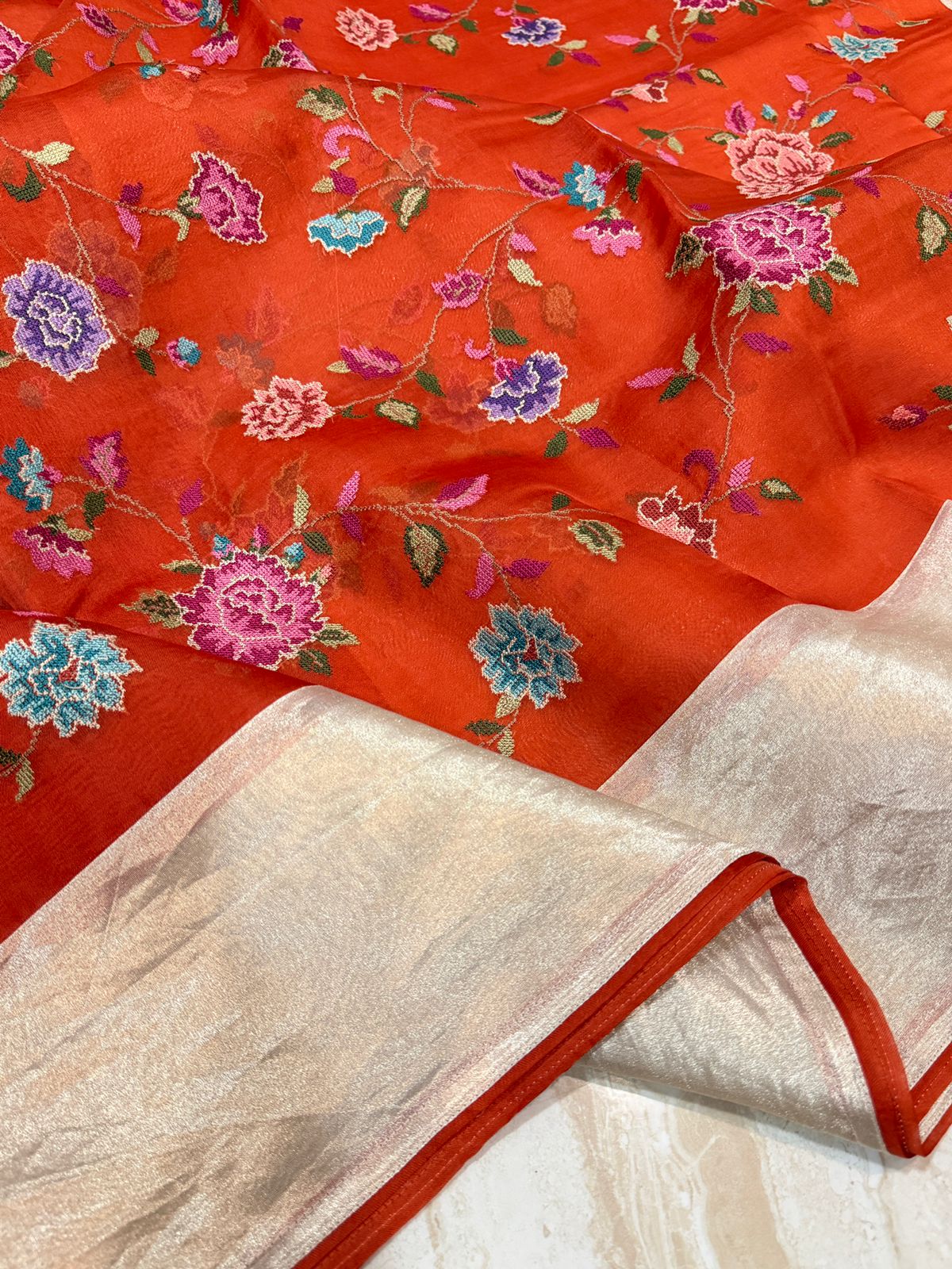 Elegant Organza Saree with All-Over Cross Stitch Embroidery & Tissue Border