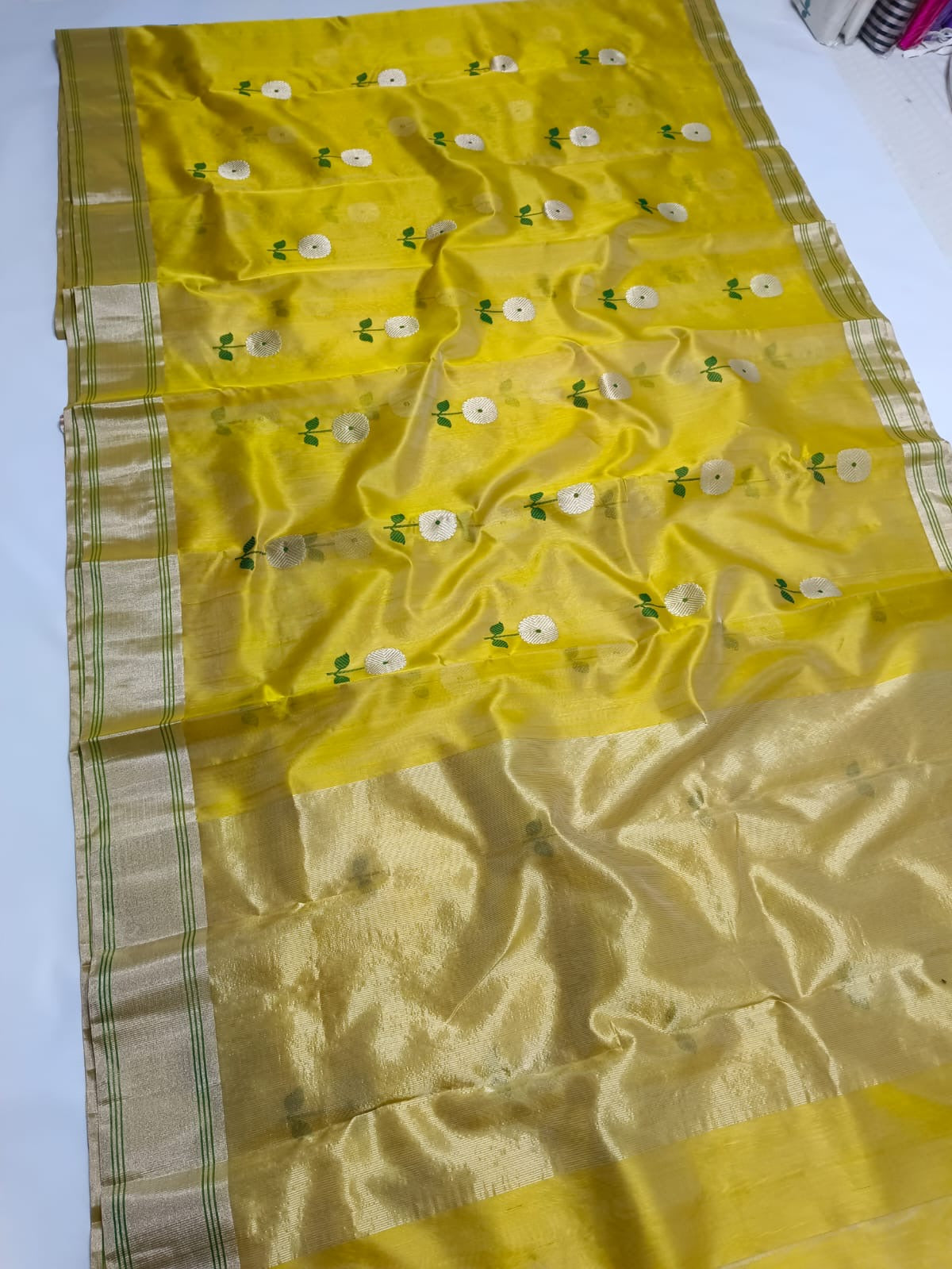 Beautiful Chanderi Pattu Silk Saree with silver zari and meenakari thread weave .